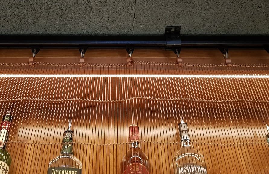 Metal curtain mounted with single clips