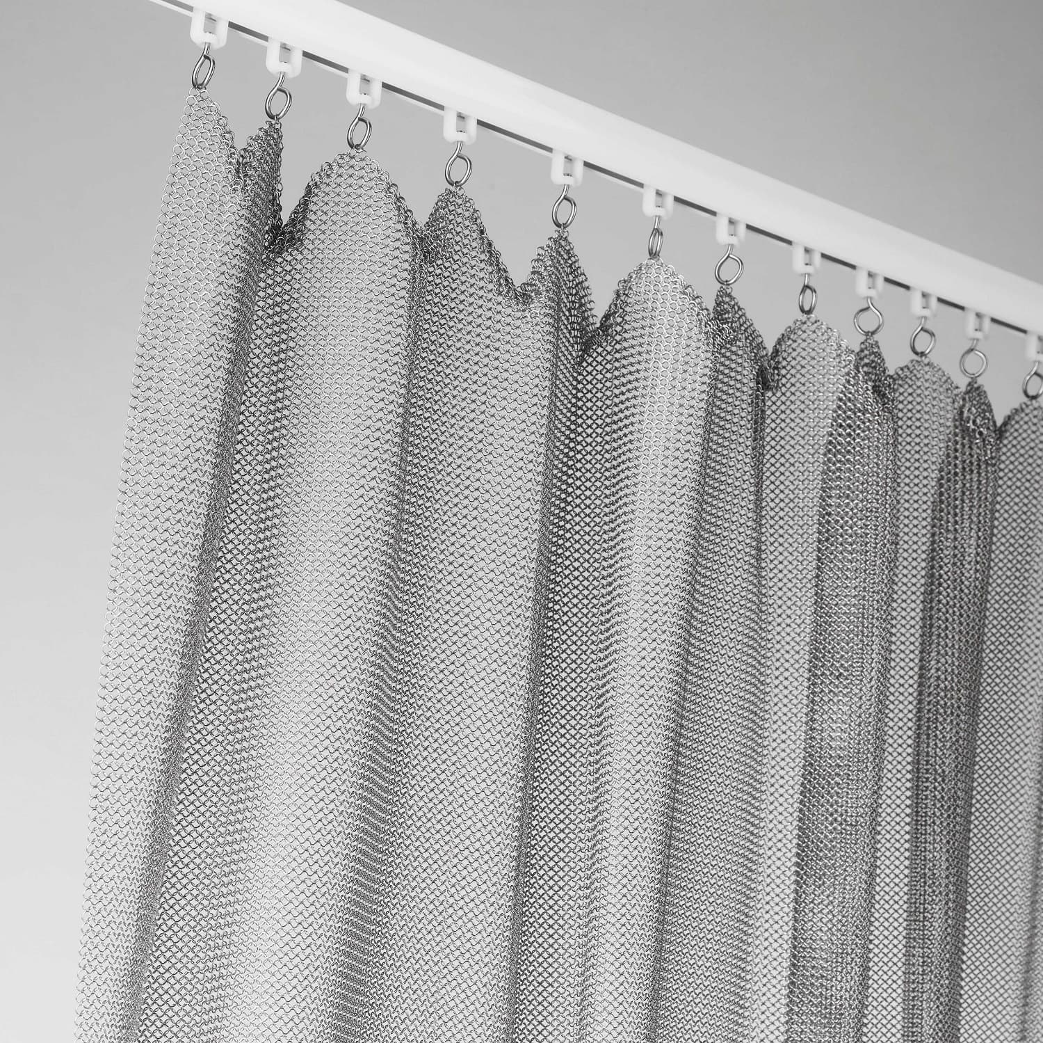 Metal curtain of welded rings, chainmail, mounted with small wheels